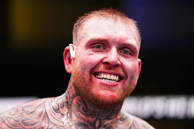 Steven Asplund smiling during UFC fight week