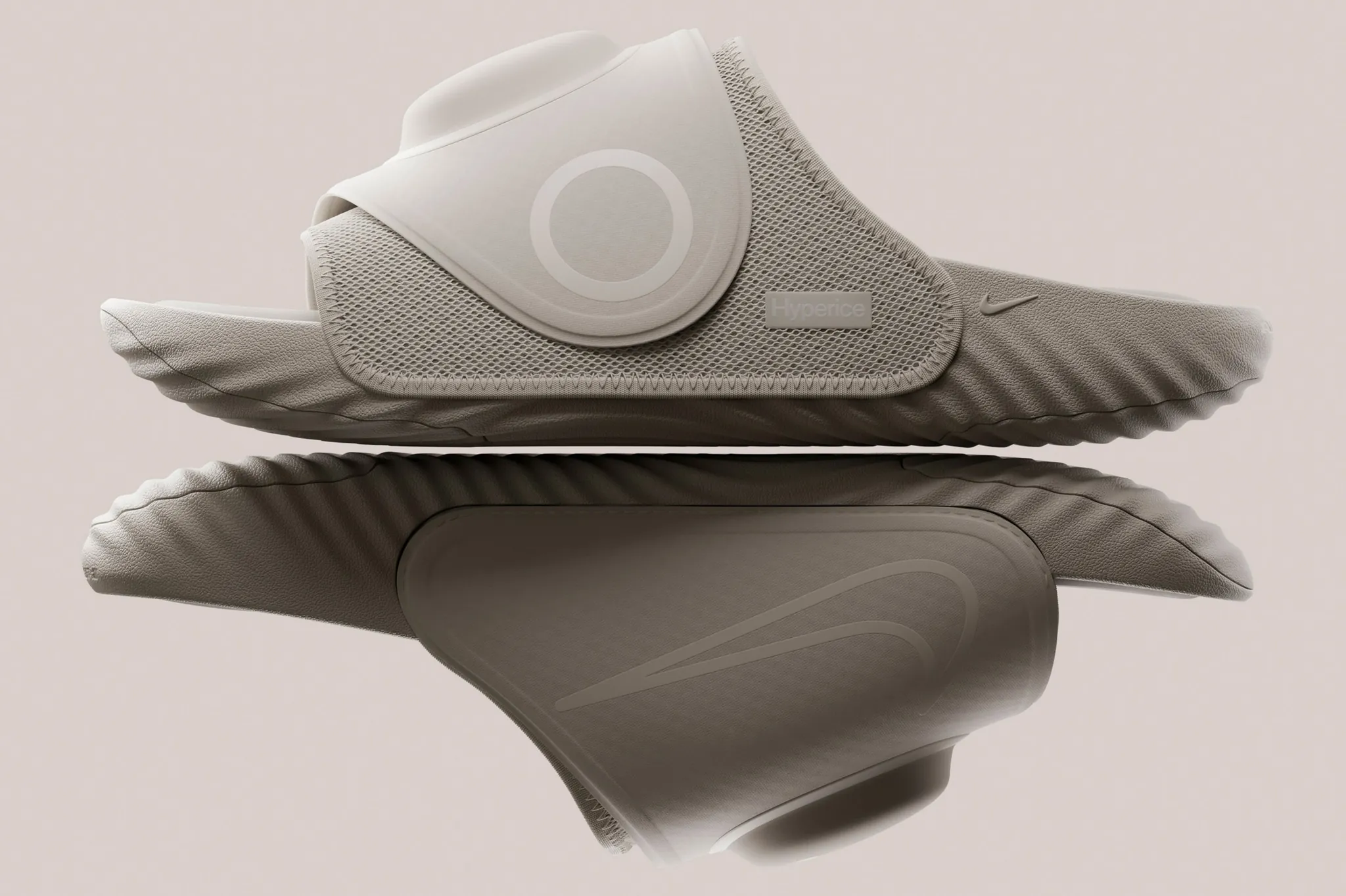 Nike Air Zoom Hyperslide recovery slide with Air Zoom sole and removable Hyperice heat and vibration pod