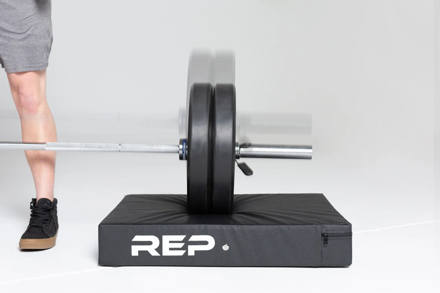 Pair of thick black foam crash pads for deadlifting
