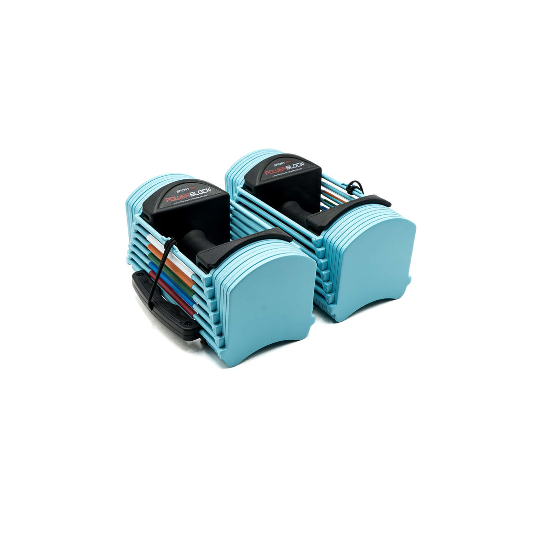 Compact blue PowerBlock adjustable dumbbells with selector pins and stacked plates