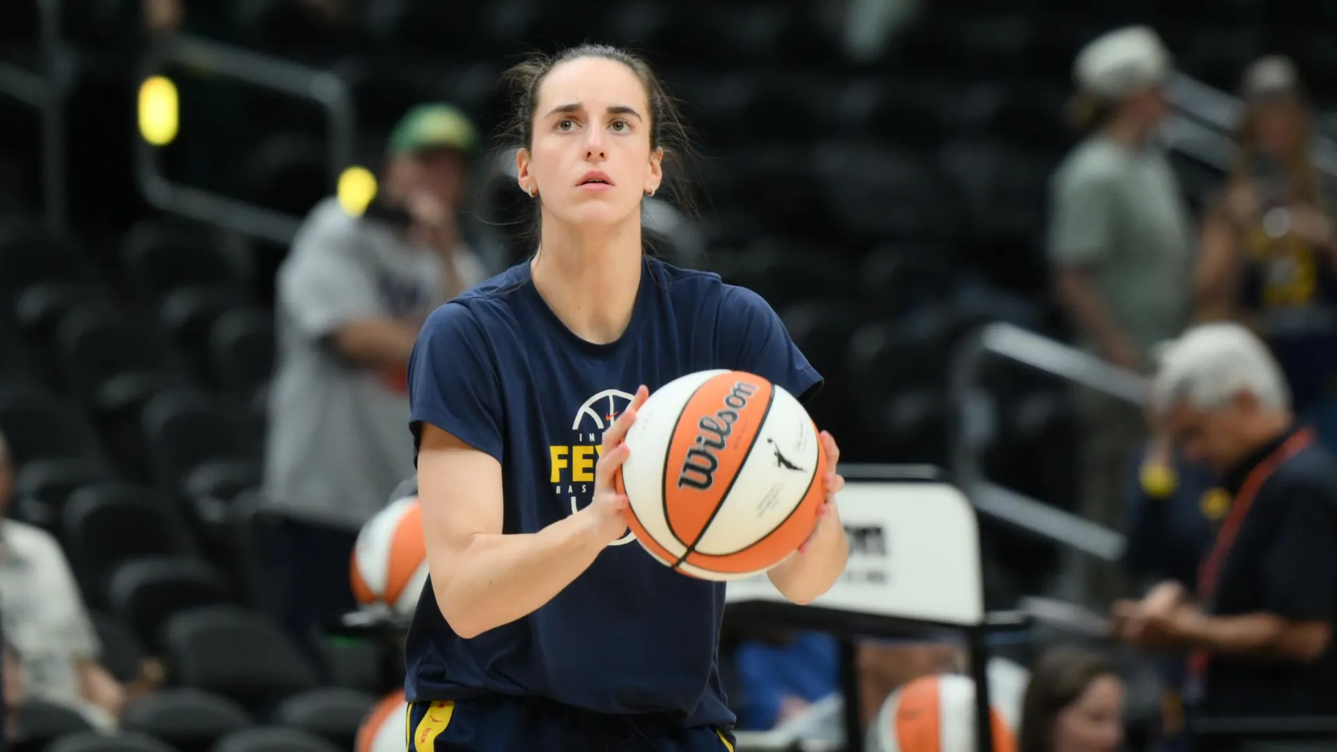 Caitlin Clark moving with a basketball during her Indiana Fever pregame warmup