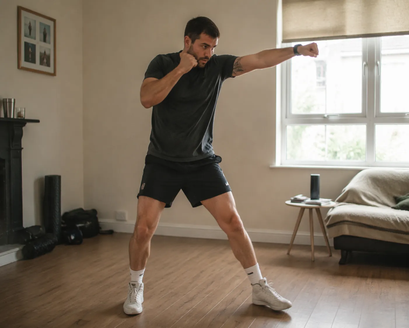 Person shadow boxing in a modest living room with no equipment