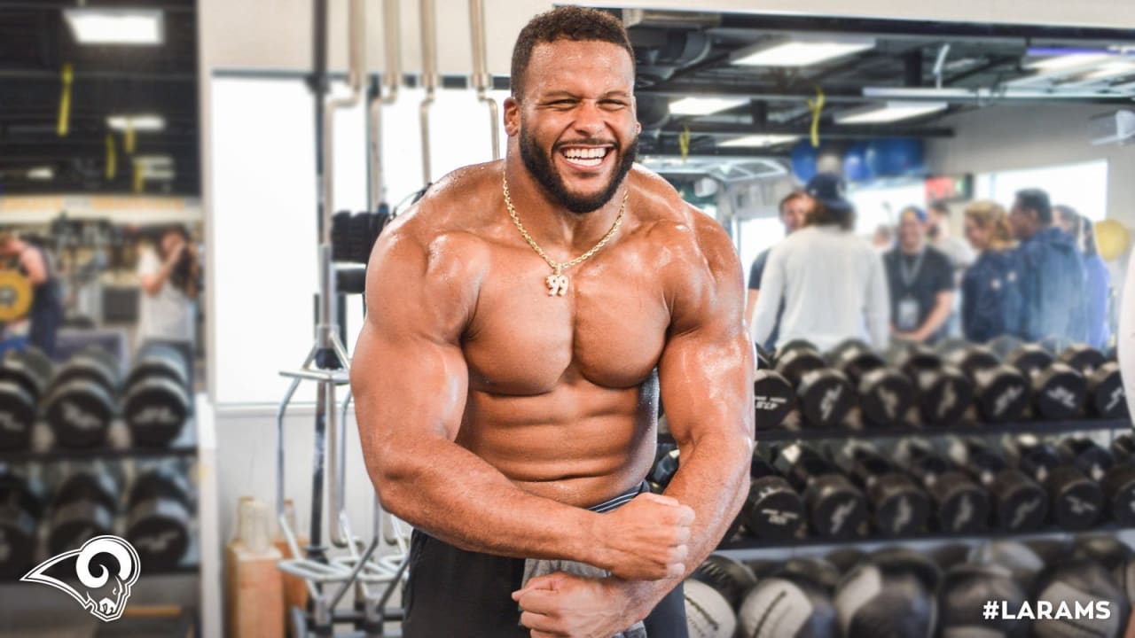 Aaron Donald training in a Rams workout jersey at the team facility